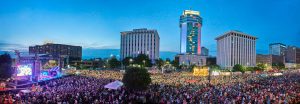A picture of a crowded outdoor concert outside of Century 2 during riverfest